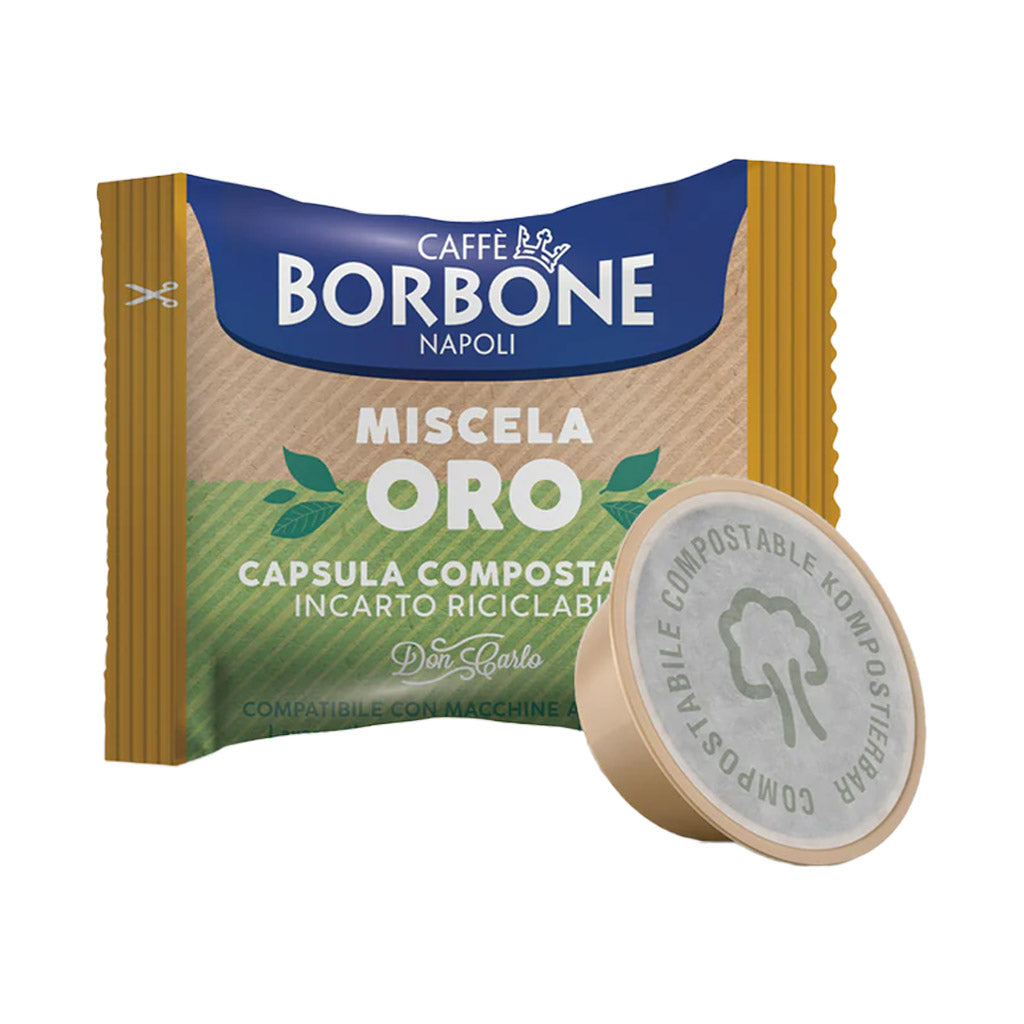 Dettaglio bustina in carta riciclabile e capsula compostabile compatibile Lavazza A Modo Mio Caffè Borbone Don Carlo Miscela Oro.
